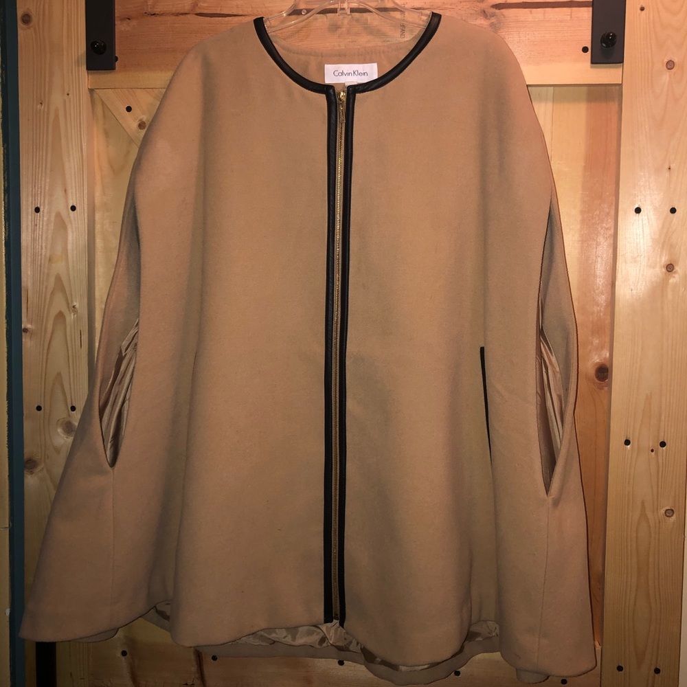 Tan with black leather trim cape